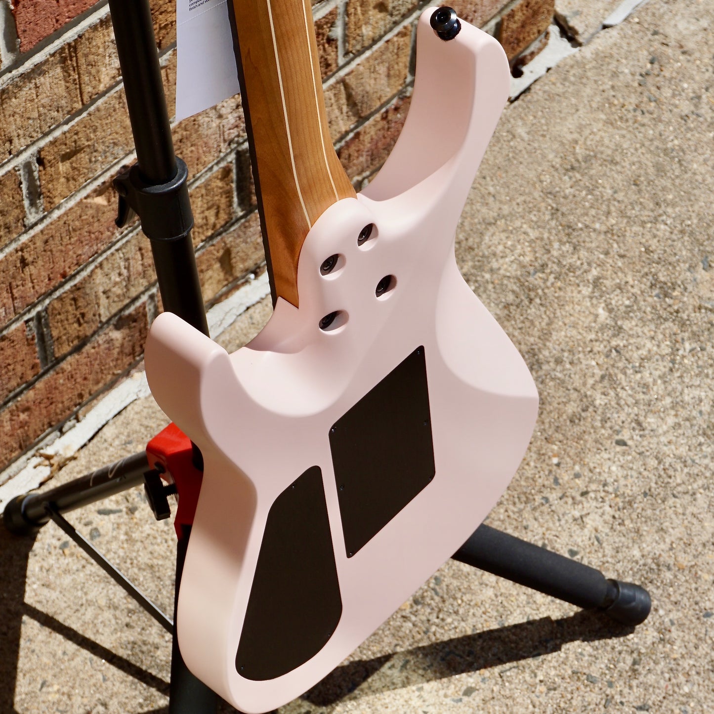 Jackson American Series Virtuoso Streaked Ebony Fingerboard Satin Shell Pink
