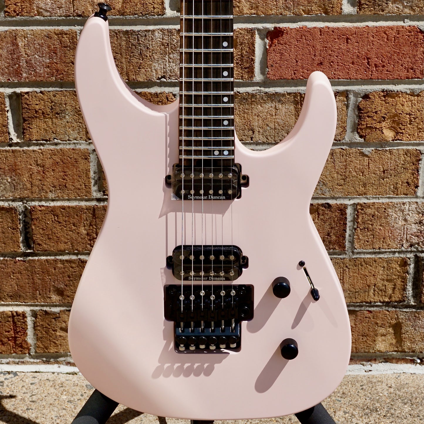 Jackson American Series Virtuoso Streaked Ebony Fingerboard Satin Shell Pink