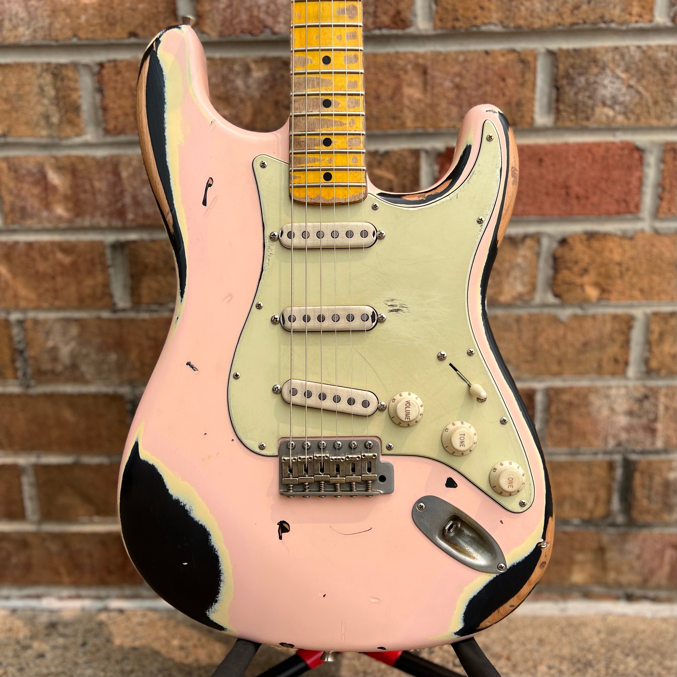 Pink and deals black guitar